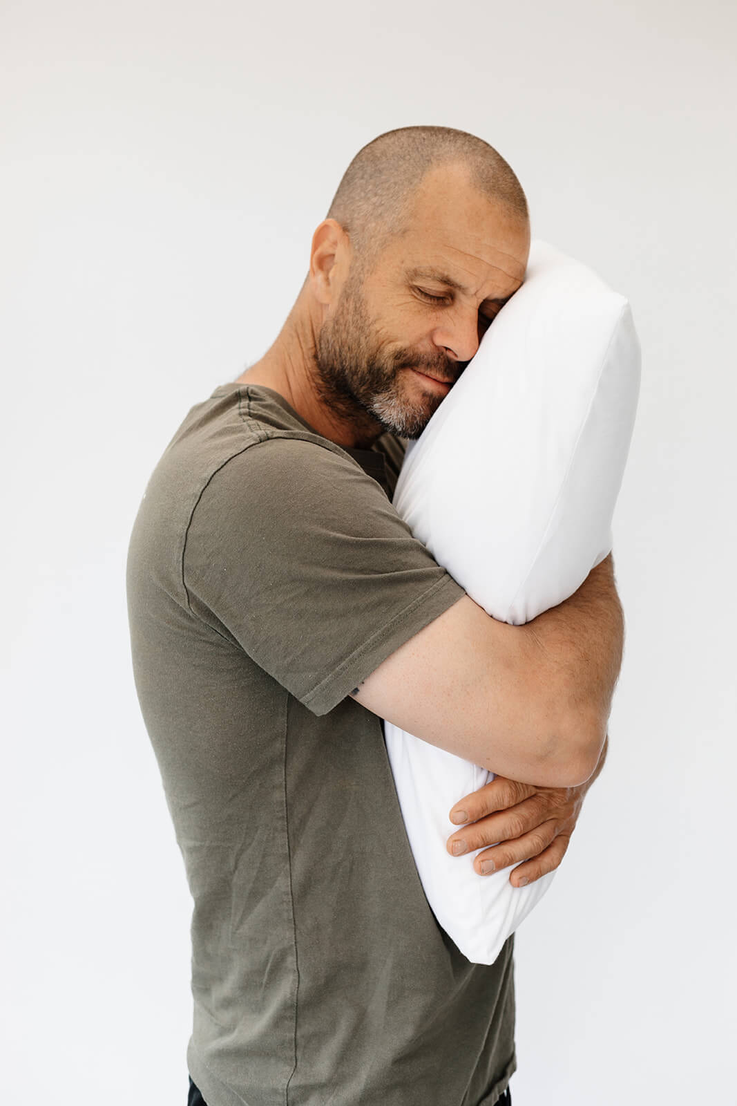 Man with a natural latex pillow